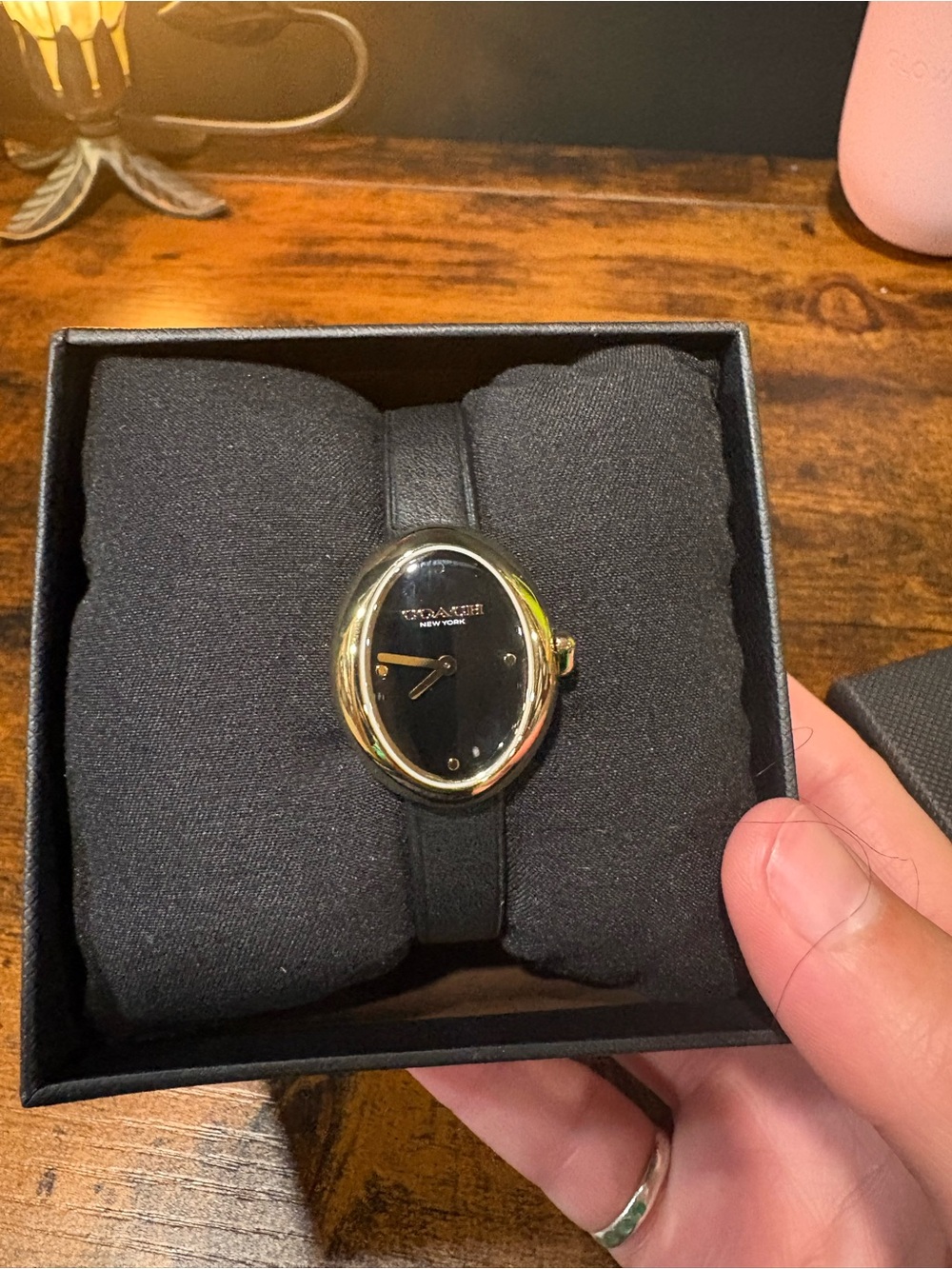 Coach Black and Gold Oval Leather Strap Women's Watch